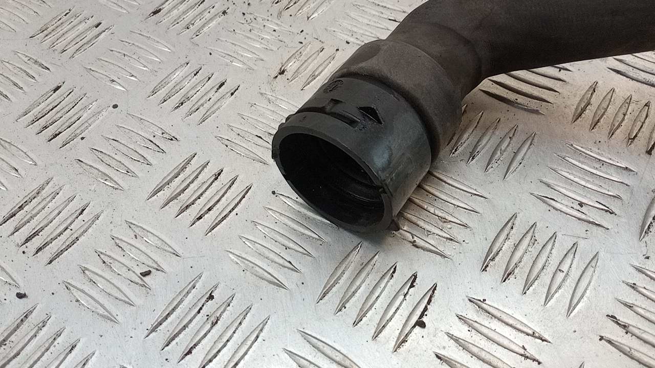 Патрубок радиатора