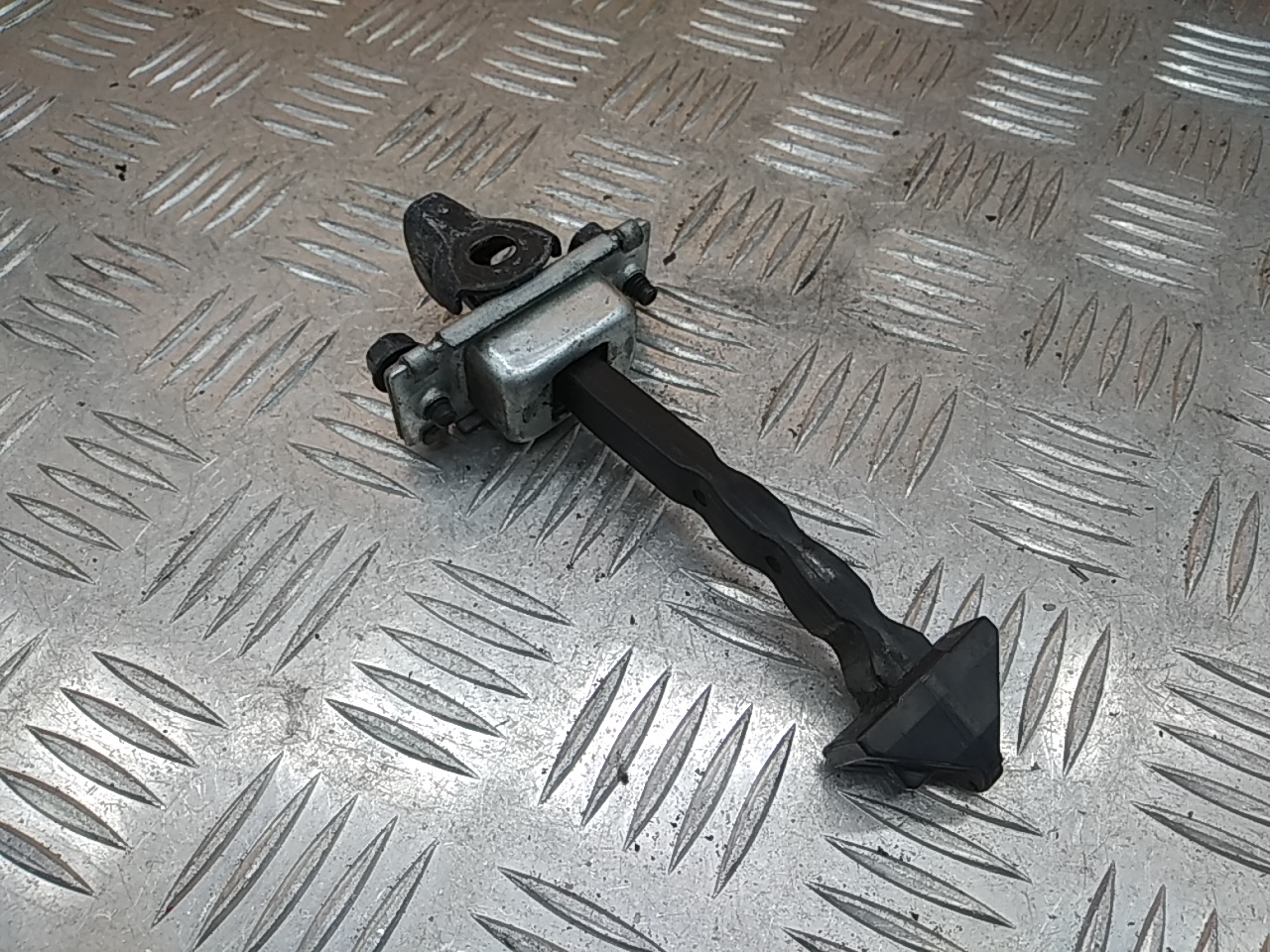 Ограничитель двери