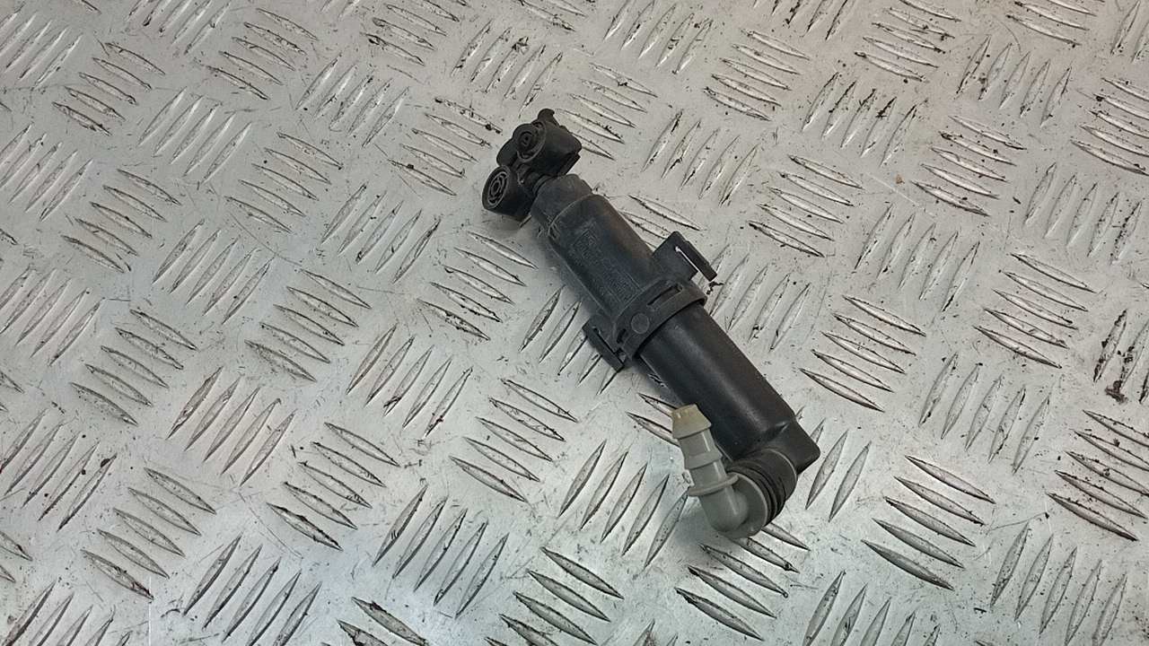 Форсунка омывателя фары