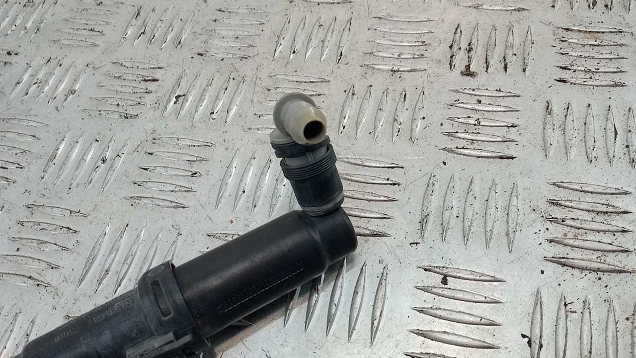 Форсунка омывателя фары