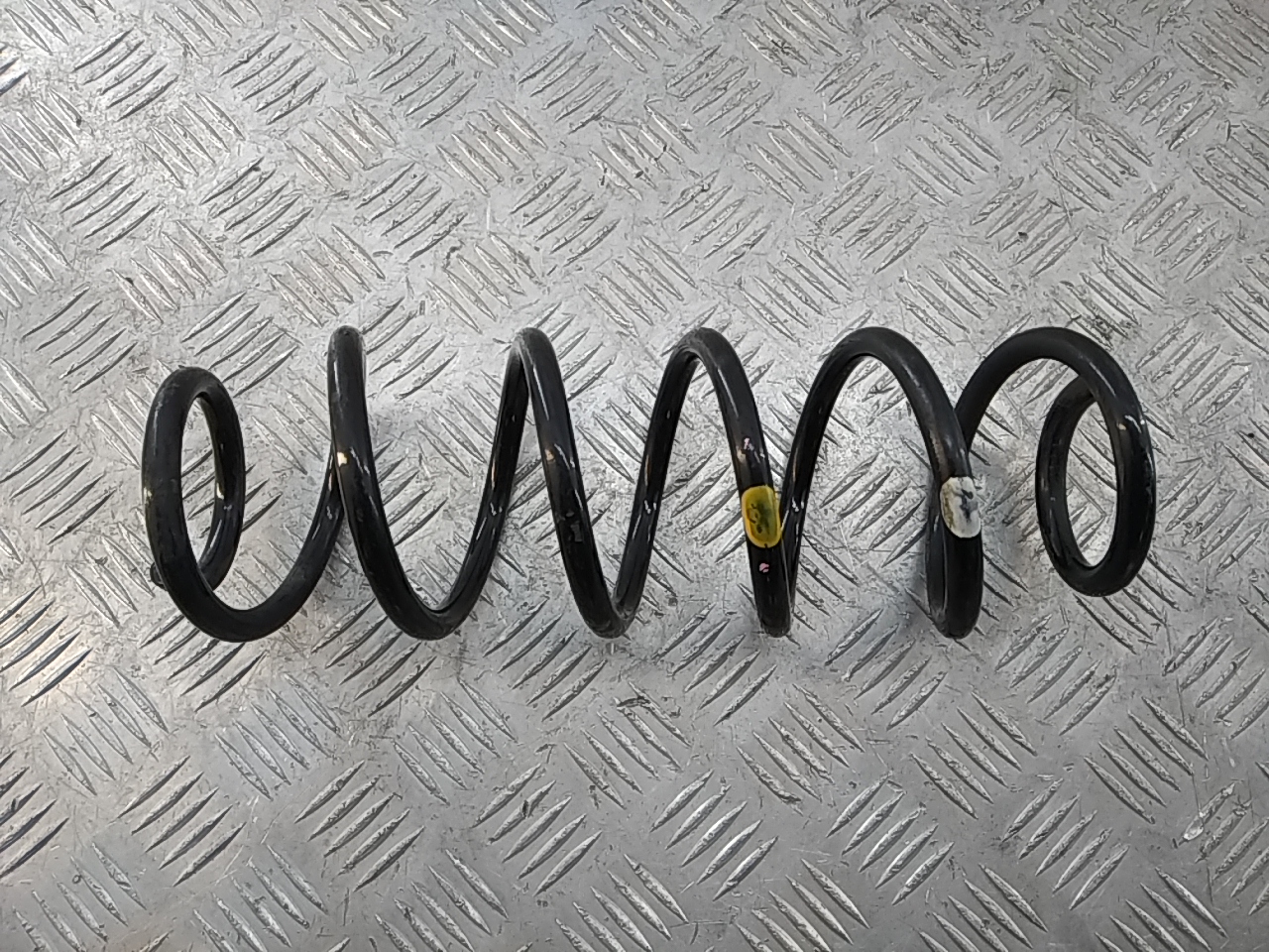 Пружина задняя