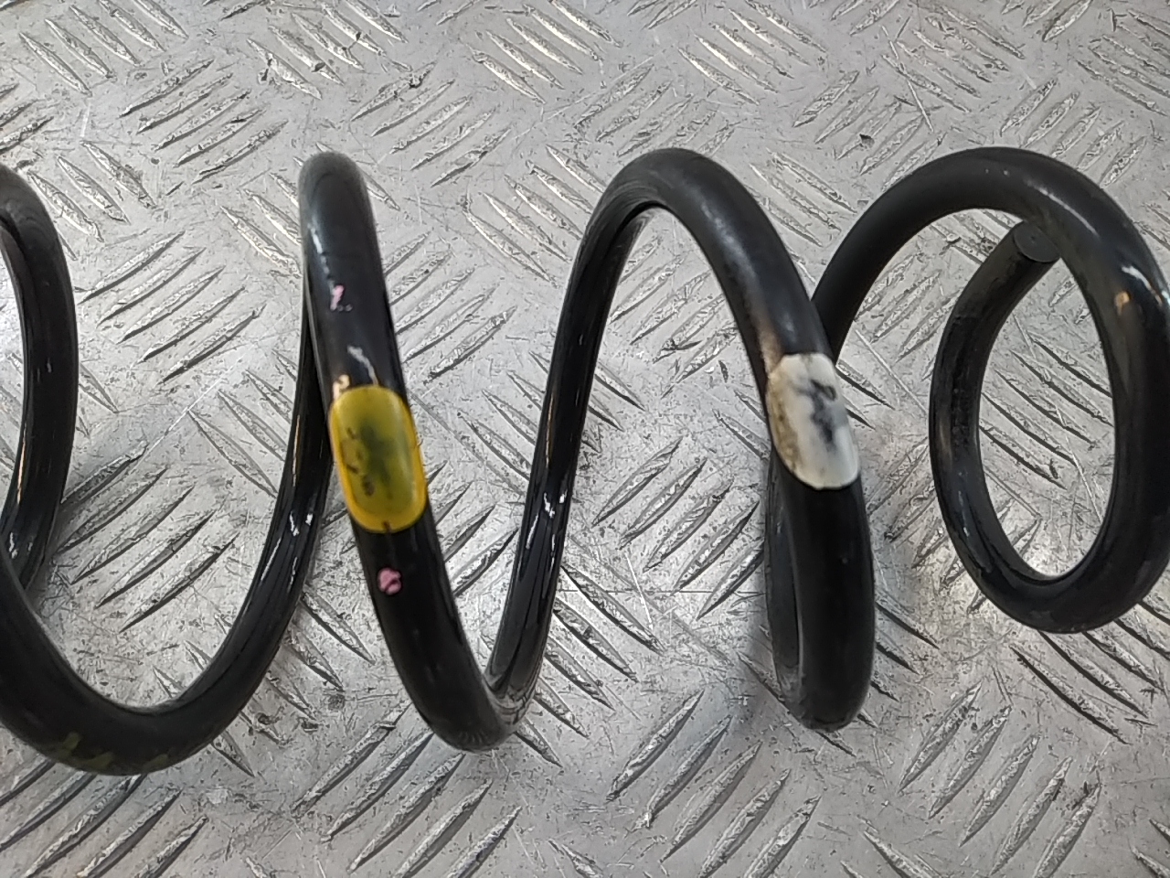 Пружина задняя