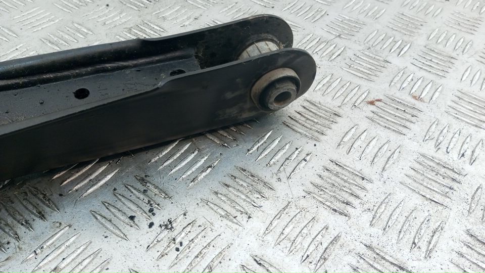 Рычаг задний нижний