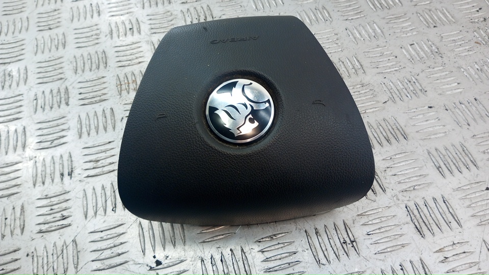 Подушка безопасности в рулевое колесо