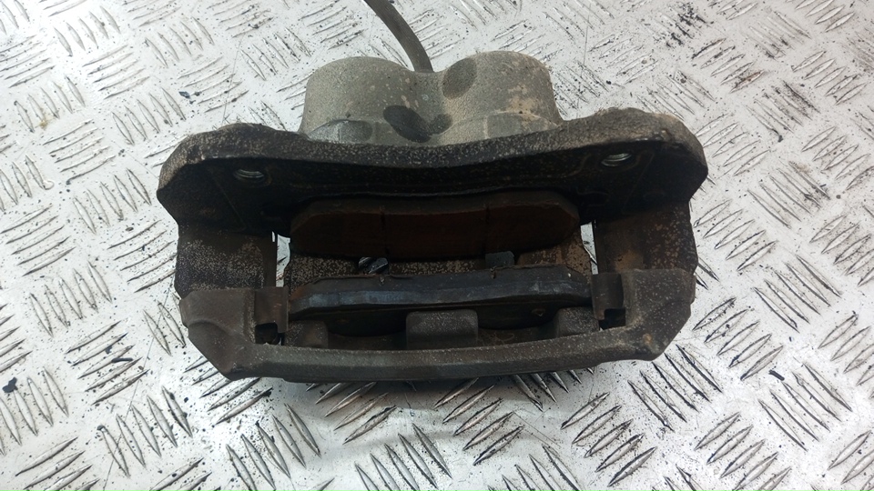 Суппорт передний левый