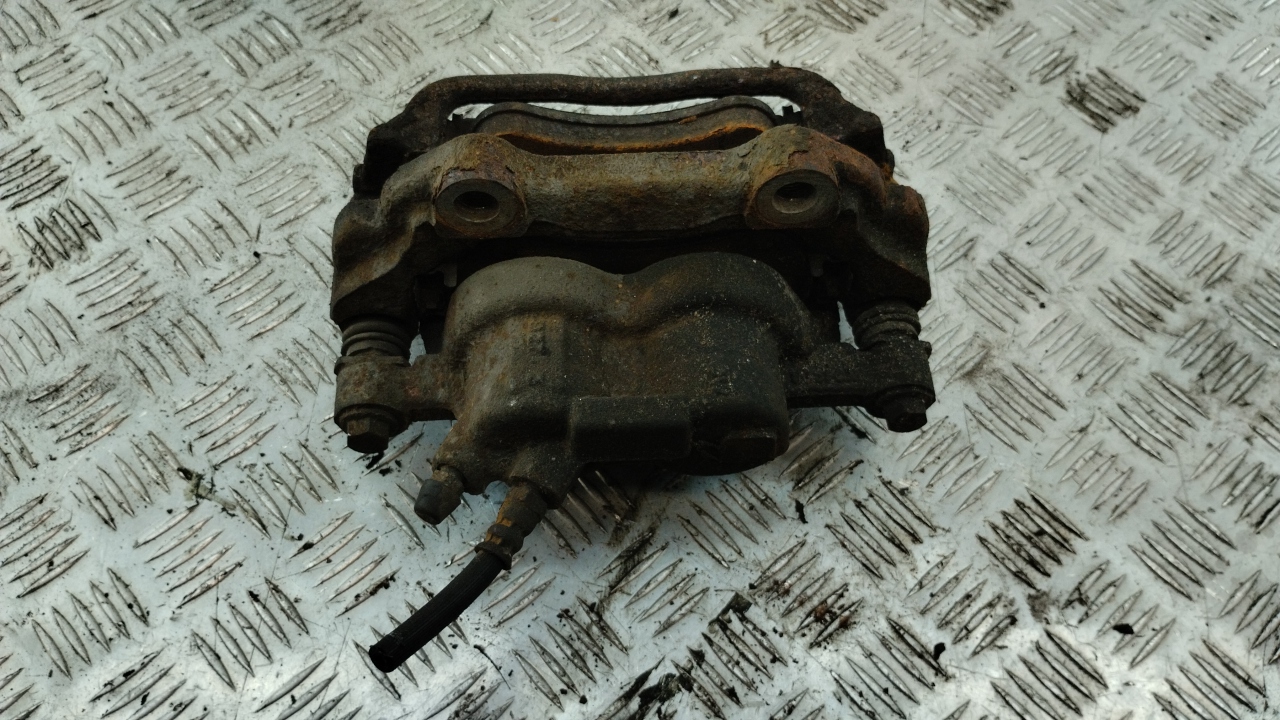 Суппорт передний левый