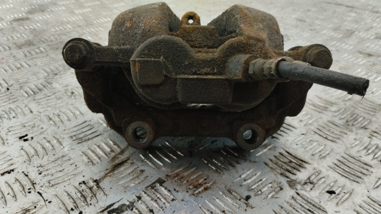 Суппорт передний левый