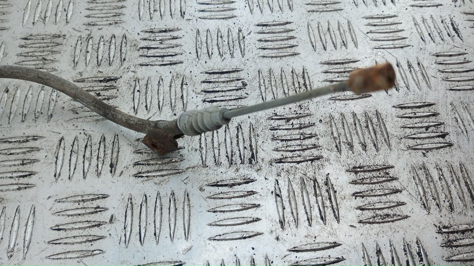 Трос стояночного тормоза центральный