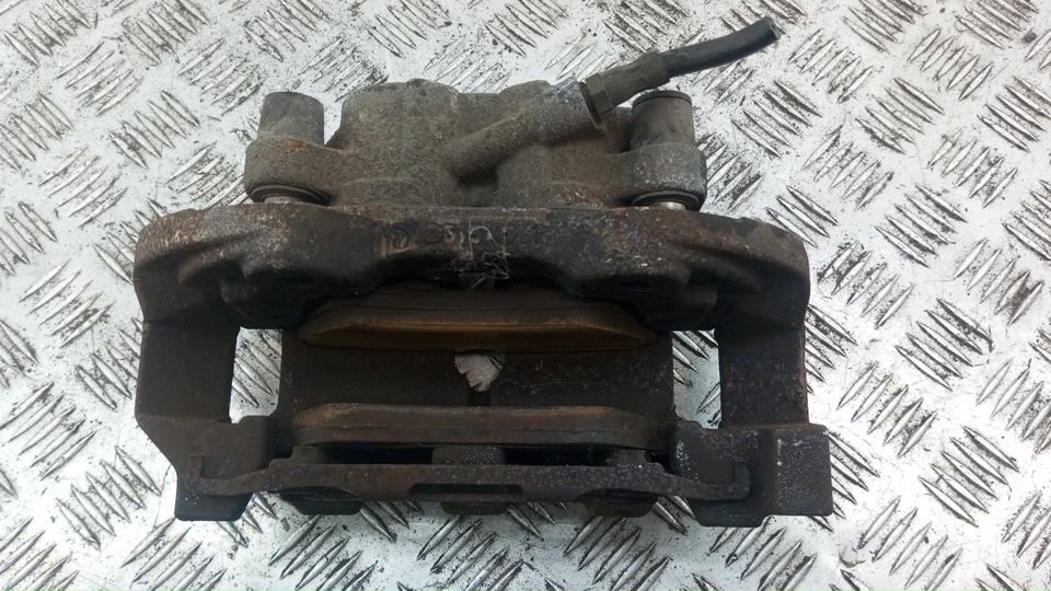 Суппорт передний левый