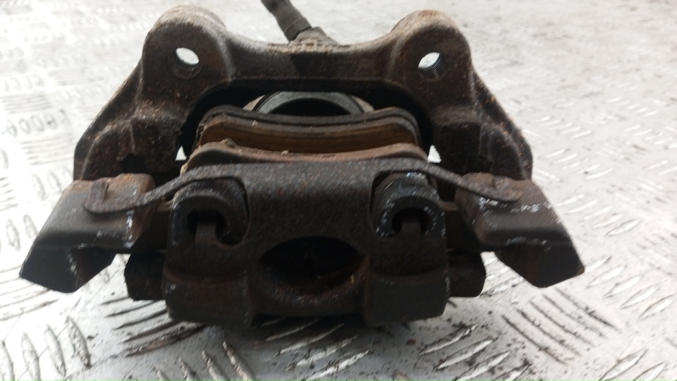 Суппорт задний левый