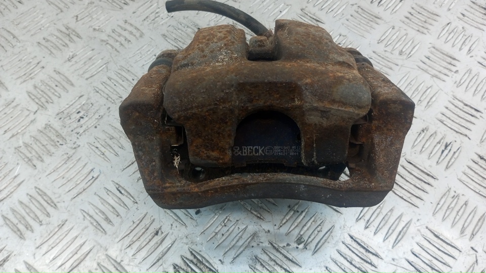 Суппорт задний левый