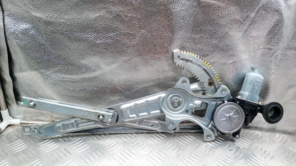 Стеклоподъемник электр. задний левый