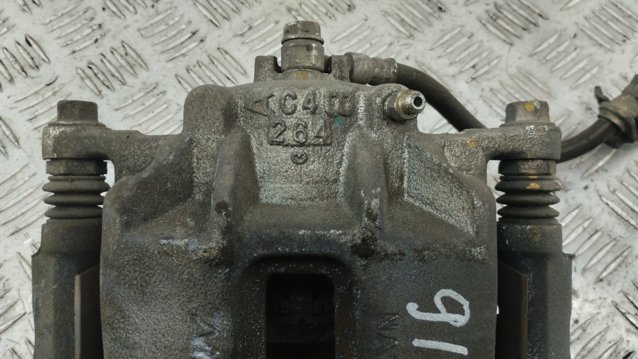 Суппорт передний левый