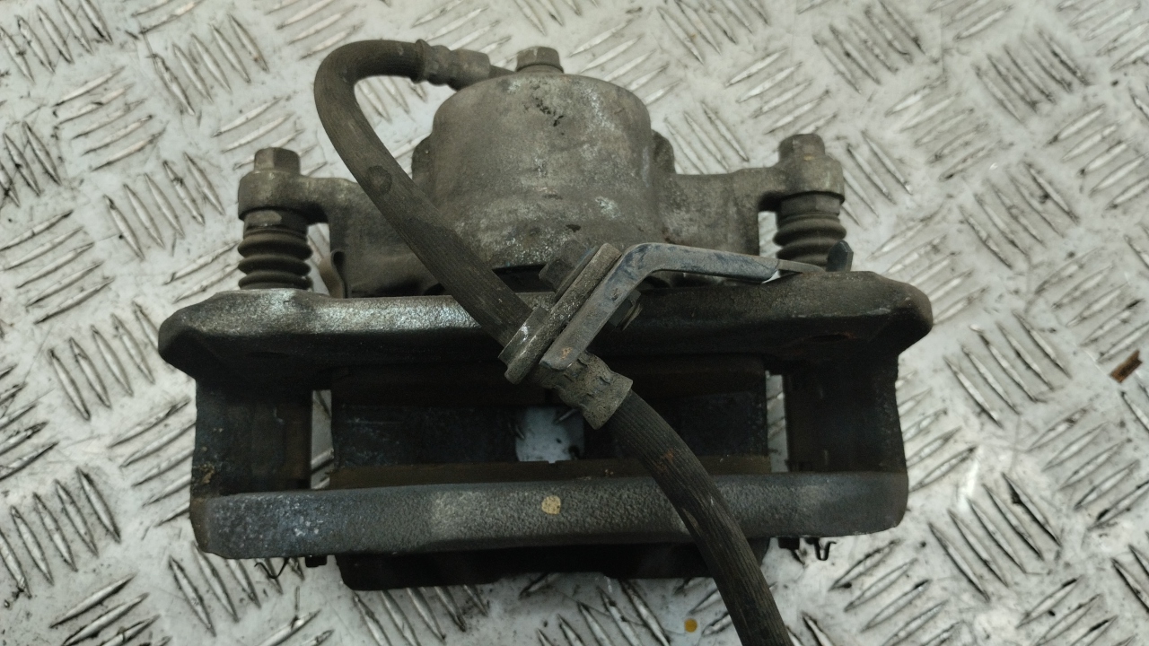 Суппорт передний левый