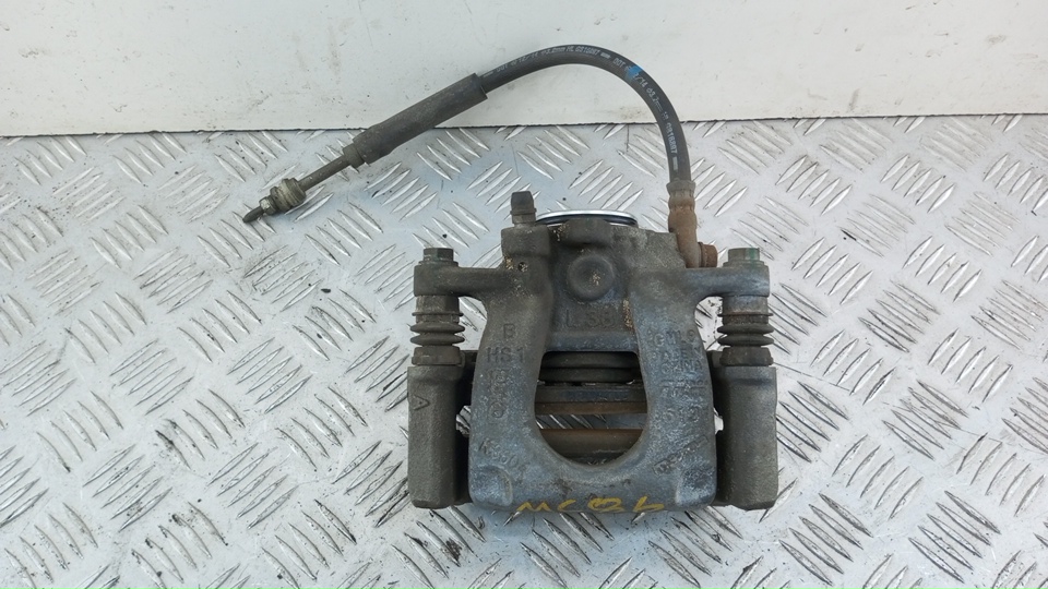 Суппорт задний левый