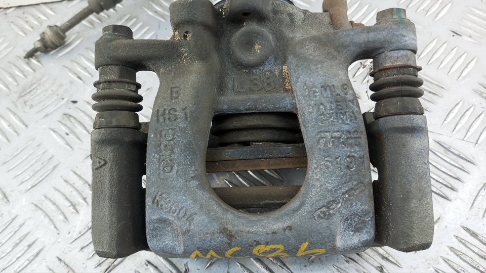 Суппорт задний левый