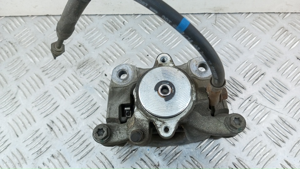 Суппорт задний левый