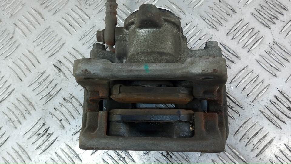 Суппорт задний левый