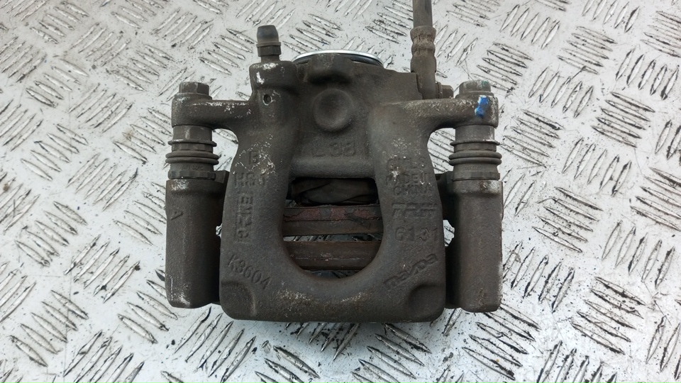 Суппорт задний левый