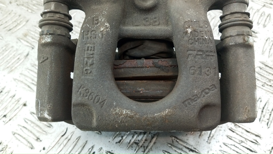 Суппорт задний левый