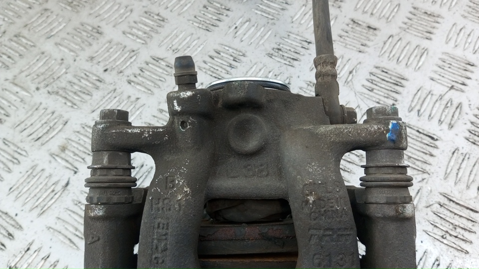 Суппорт задний левый