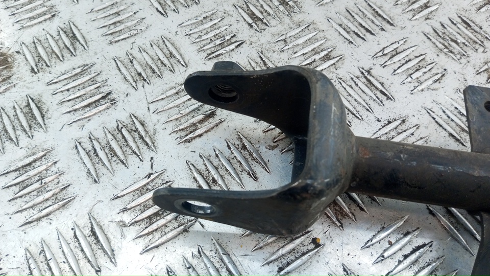 Тяга задняя поперечная левая