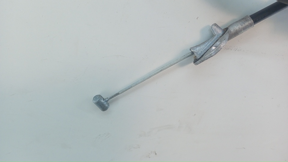 Трос стояночного тормоза левый