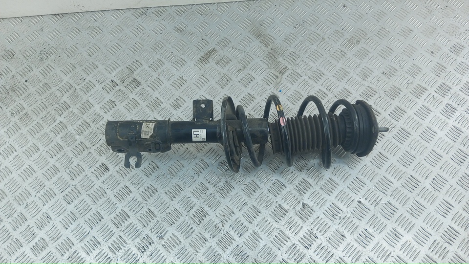 Амортизатор передний левый