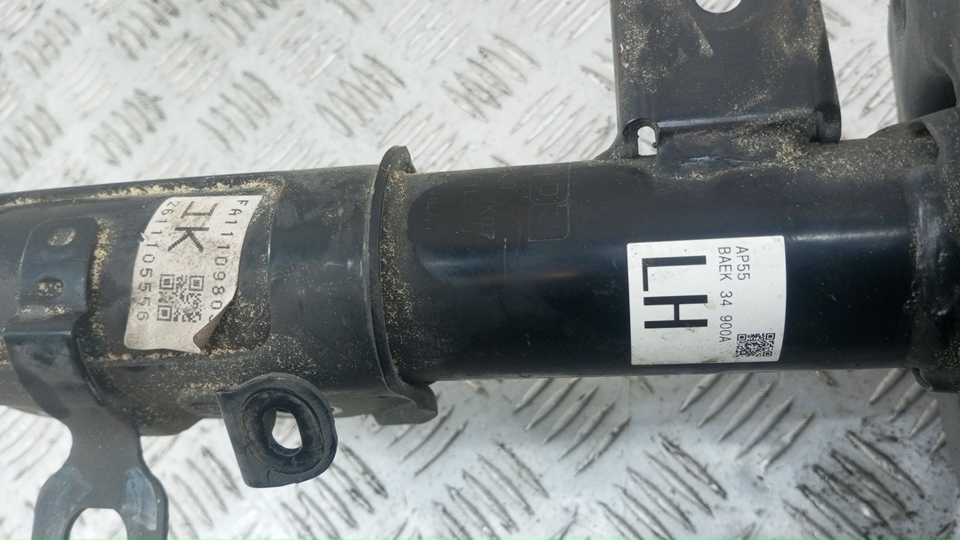 Амортизатор передний левый