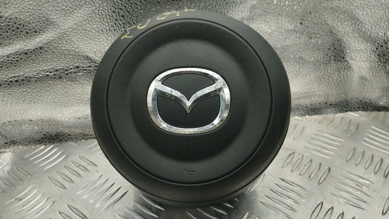 Подушка безопасности в рулевое колесо