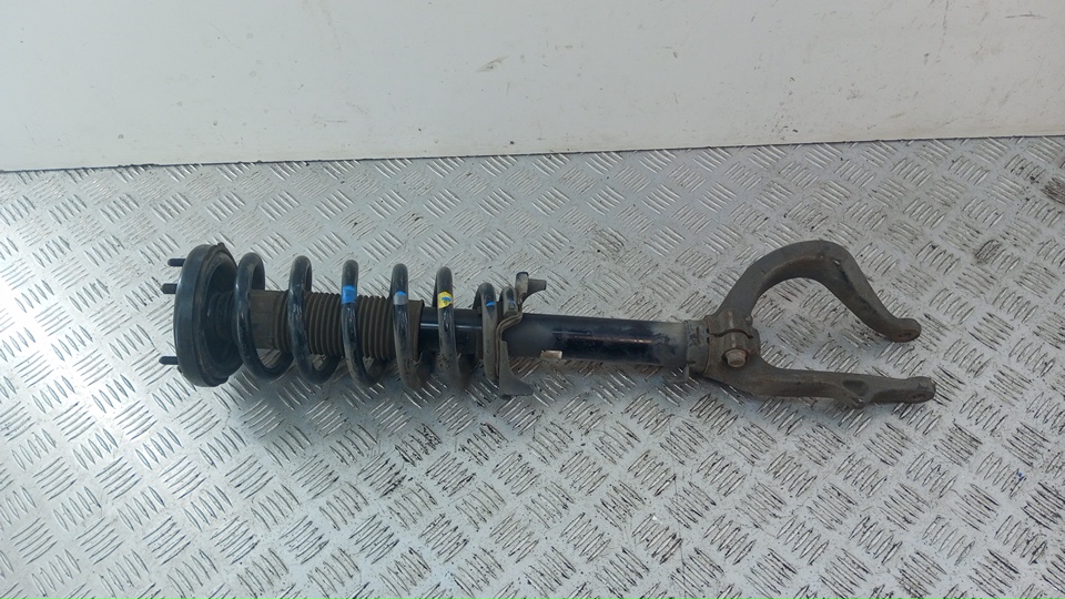 Амортизатор передний левый