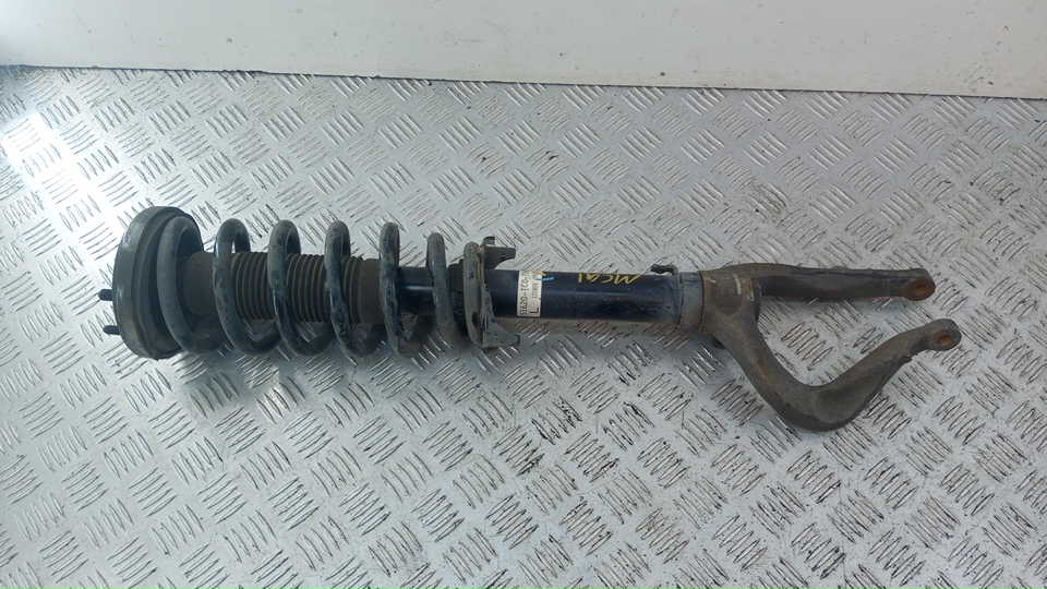 Амортизатор передний левый