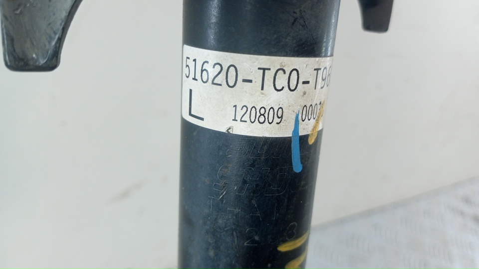 Амортизатор передний левый