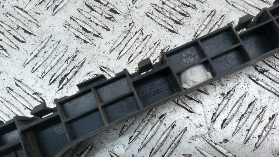 Кронштейн заднего бампера левый