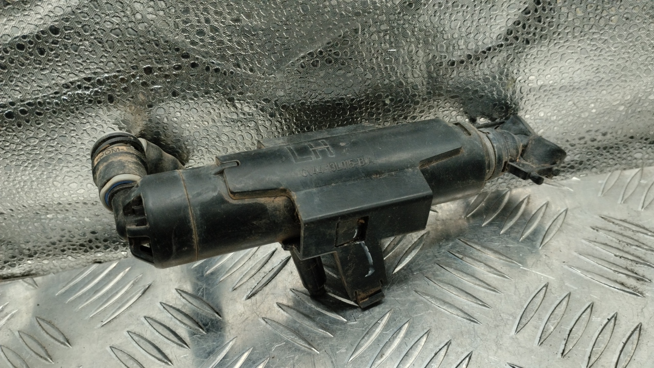 Форсунка омывателя фары