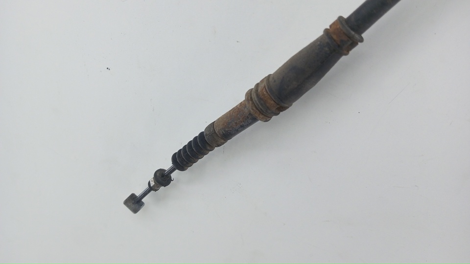 Трос стояночного тормоза левый