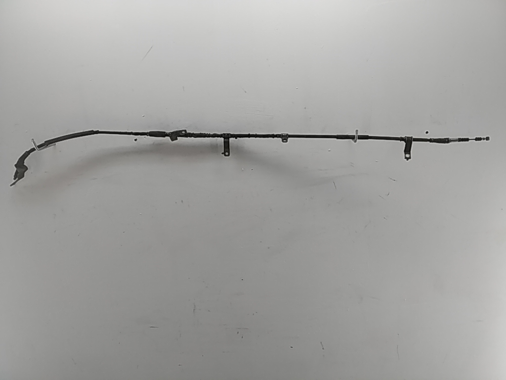 Трос стояночного тормоза левый