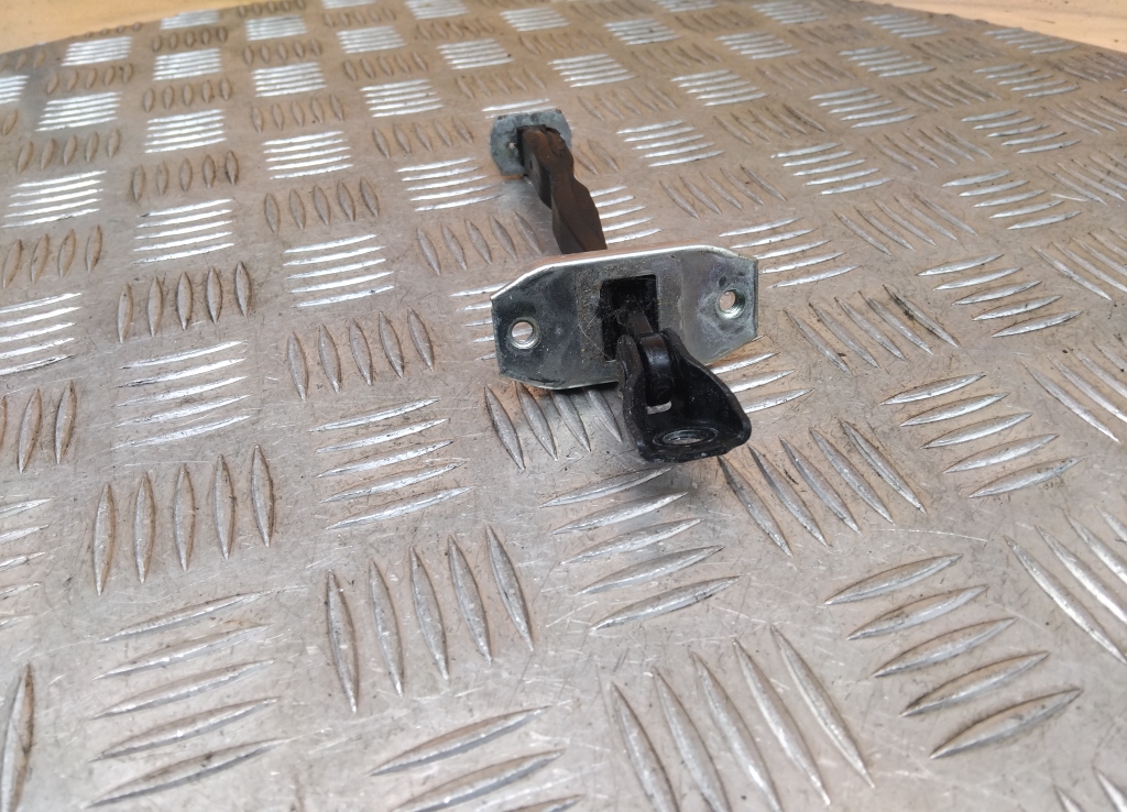 Ограничитель двери