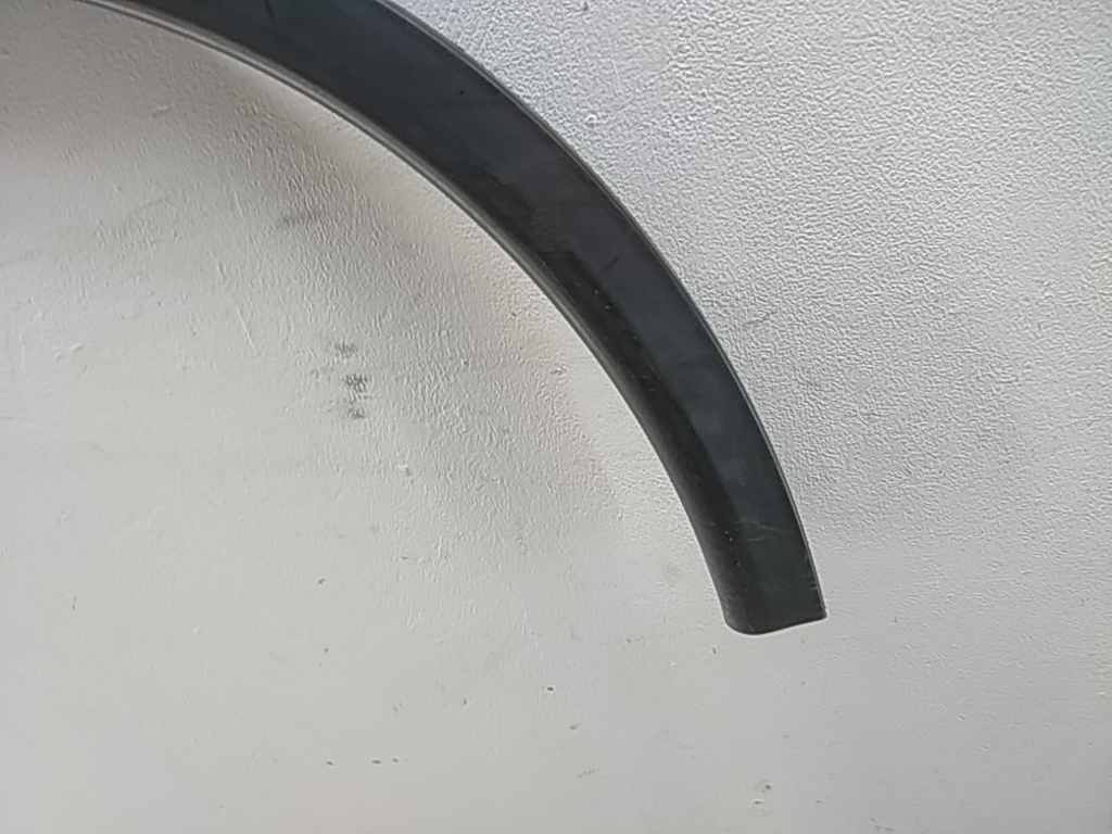 Накладка заднего крыла левого