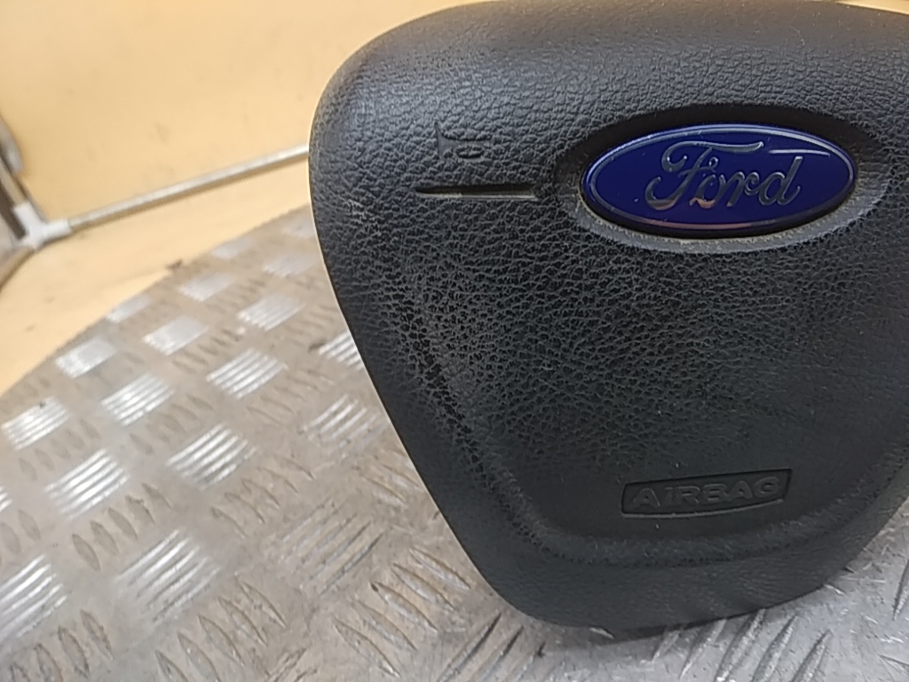 Подушка безопасности в рулевое колесо