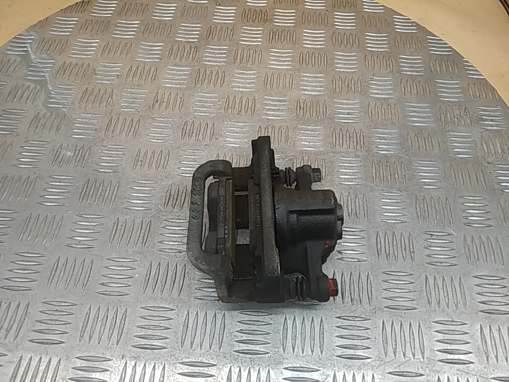 Суппорт задний левый