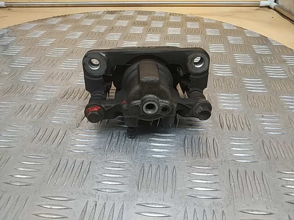 Суппорт задний левый