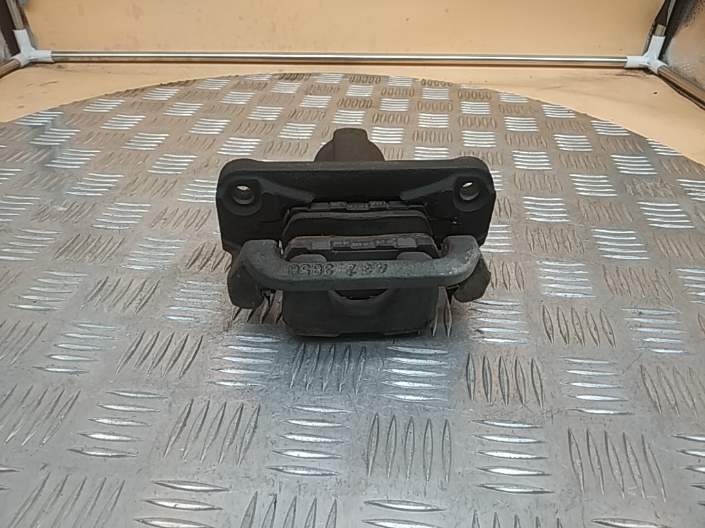 Суппорт задний левый