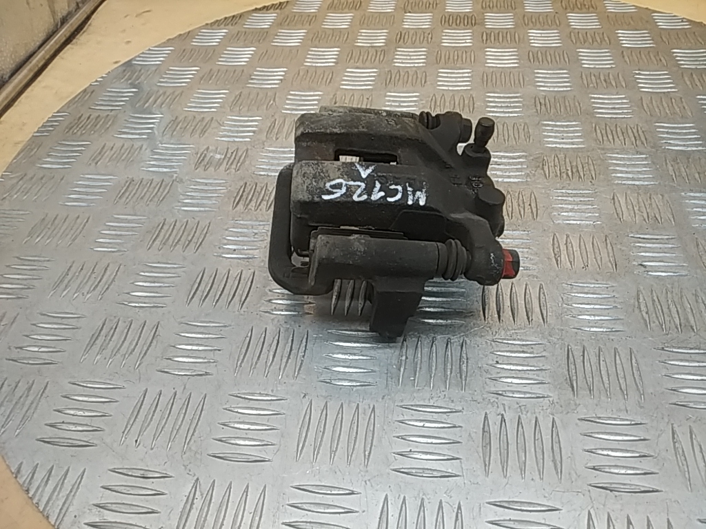 Суппорт задний левый