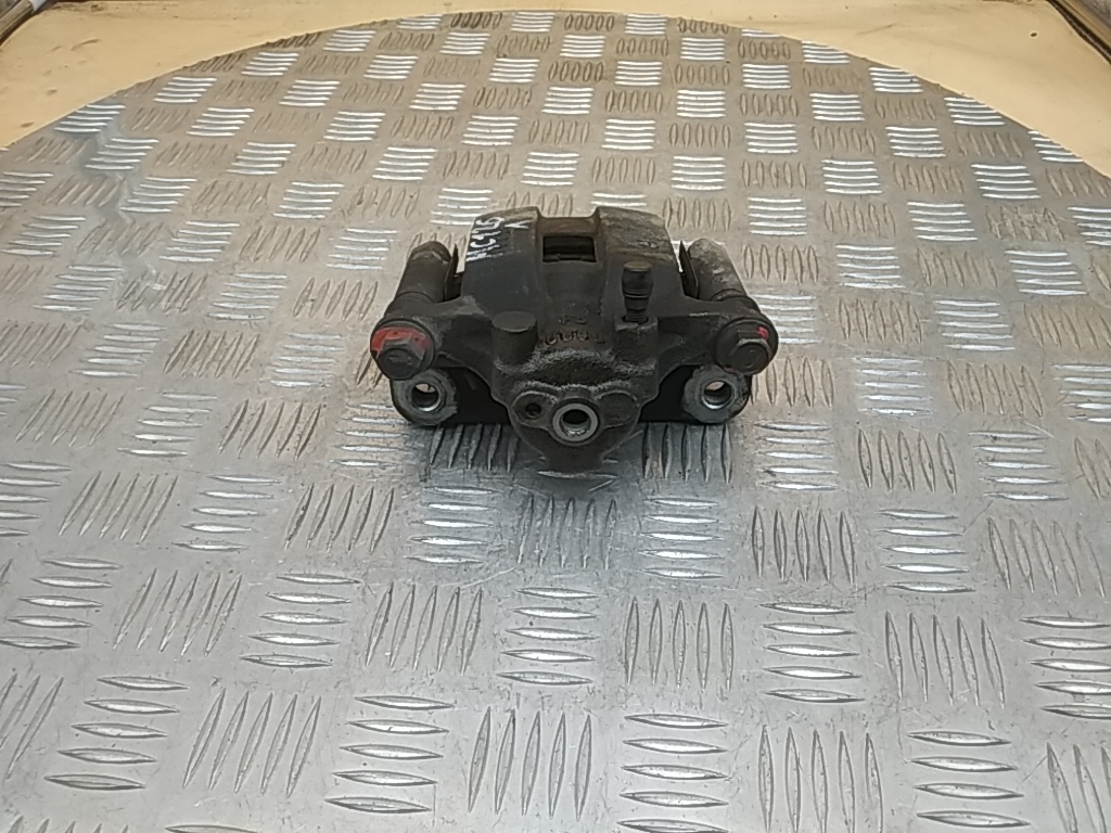 Суппорт задний левый