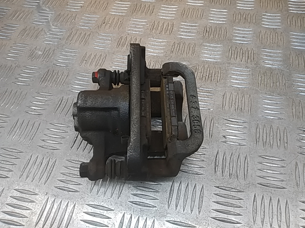 Суппорт задний левый