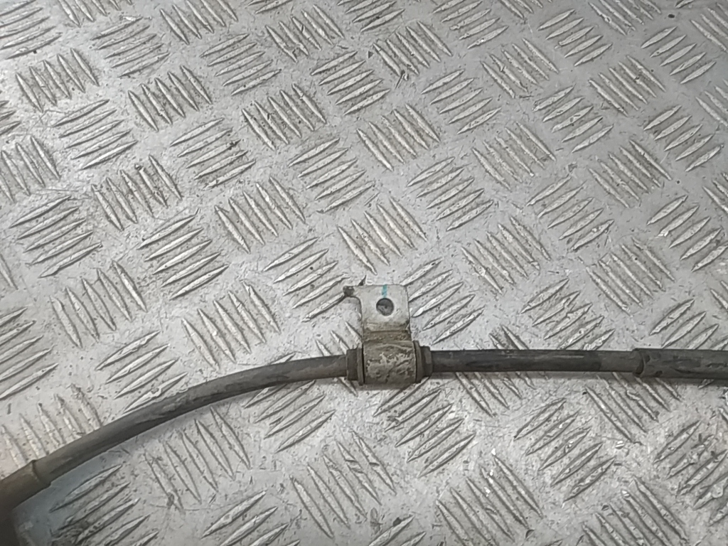 Трос стояночного тормоза левый