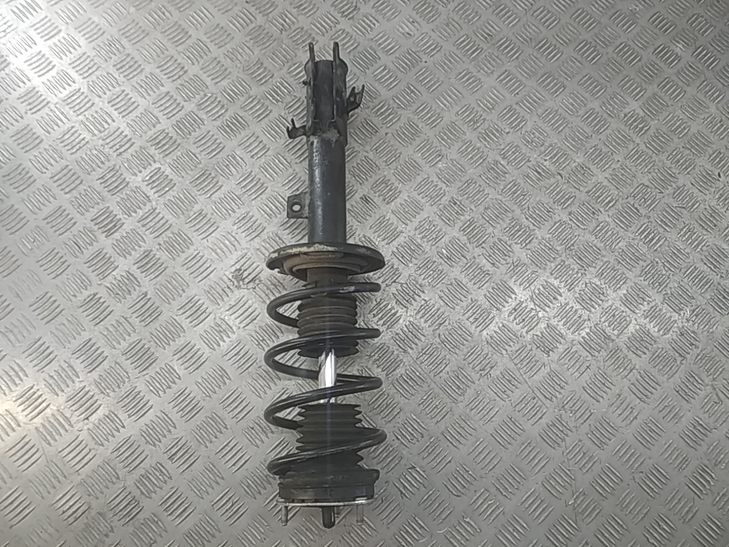 Амортизатор передний левый