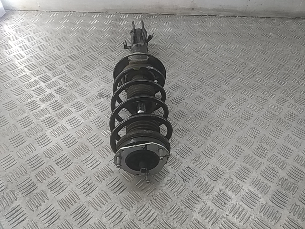 Амортизатор передний левый