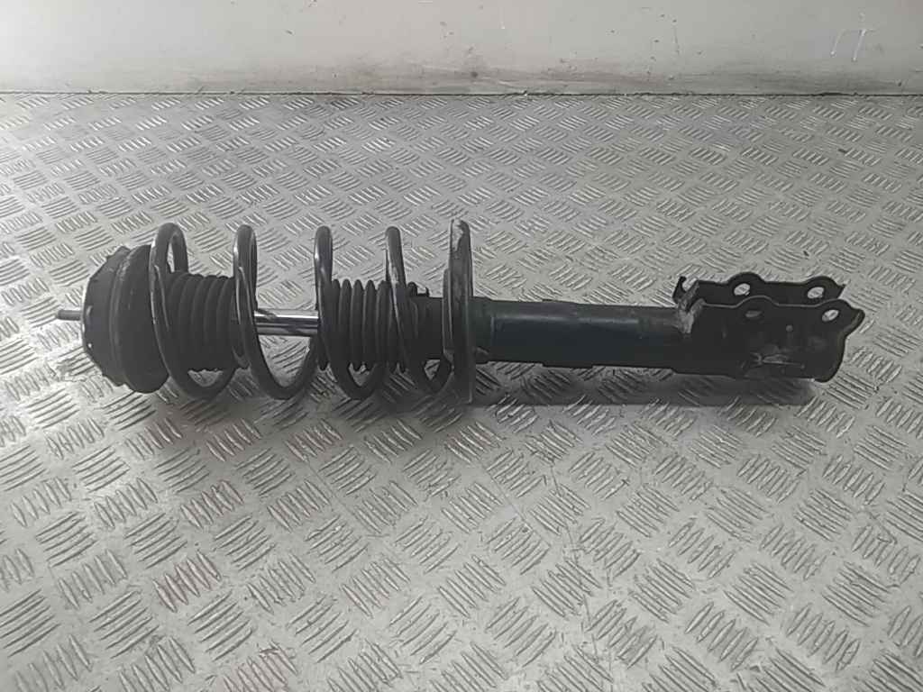 Амортизатор передний левый